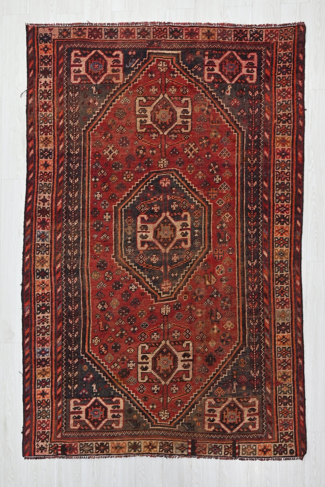 red Medium rug 5' 0" x 7' 9"