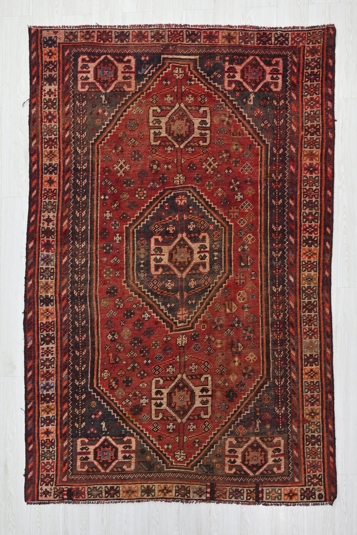 red Medium rug 5' 0" x 7' 9"