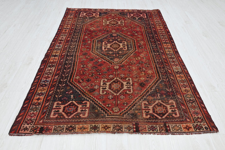 red Medium rug 5' 0" x 7' 9"