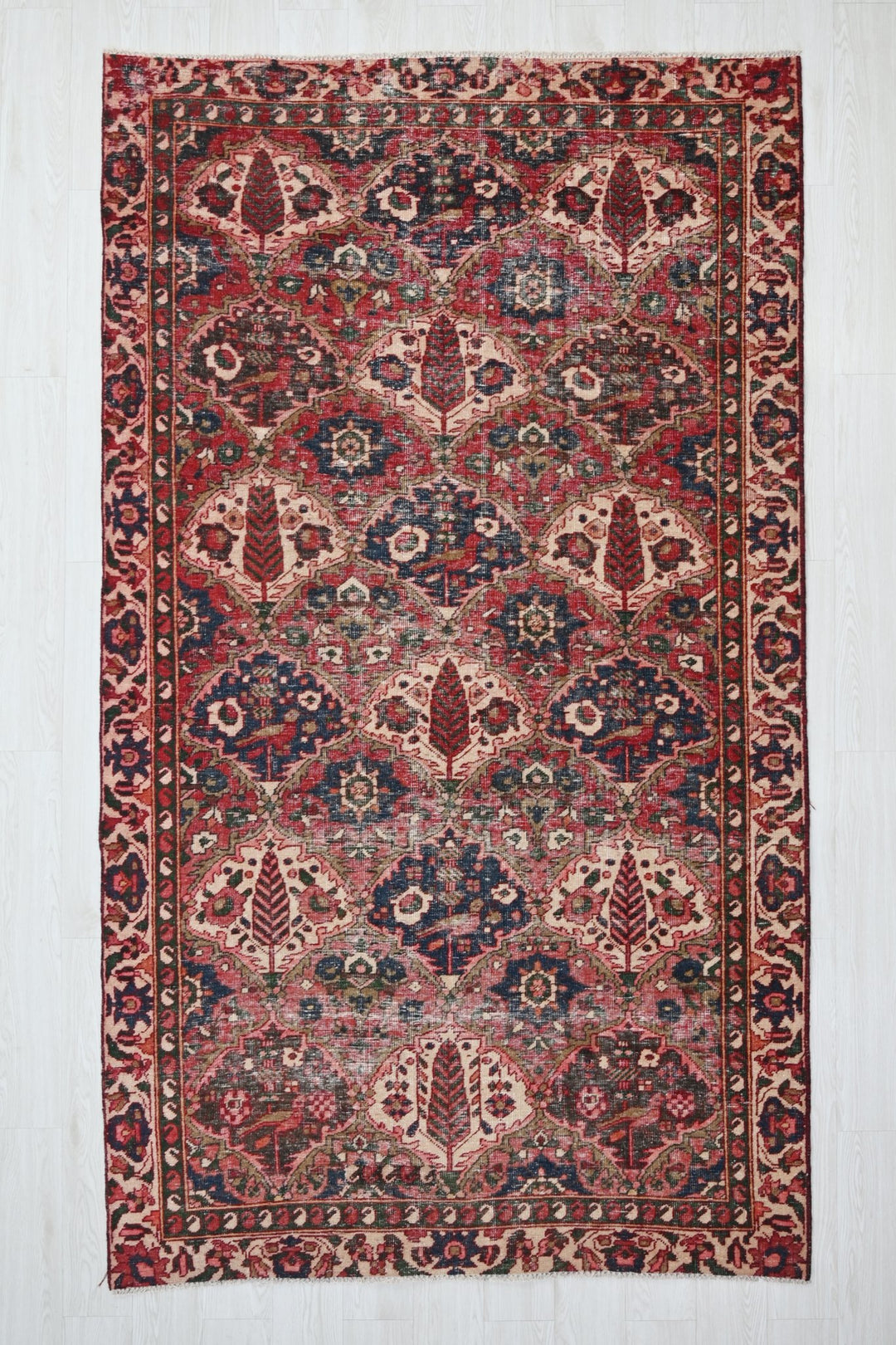 red Large rug 5' 0" x 9' 8"