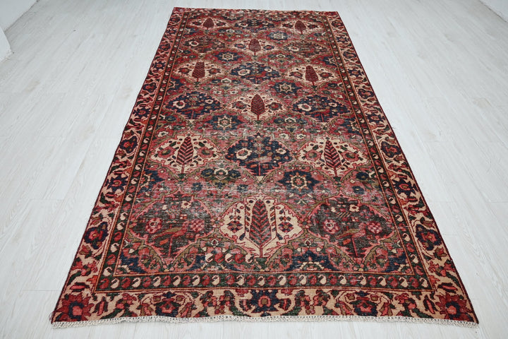red Large rug 5' 0" x 9' 8"