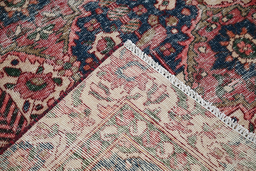 red Large rug 5' 0" x 9' 8"