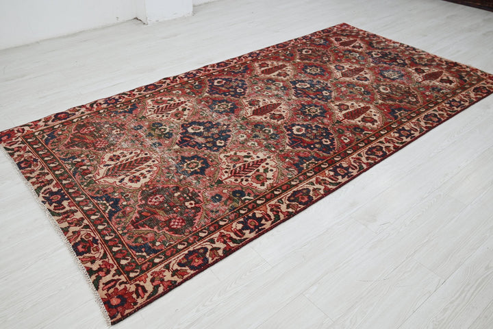 red Large rug 5' 0" x 9' 8"