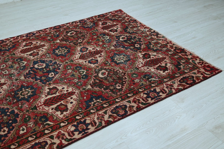 red Large rug 5' 0" x 9' 8"