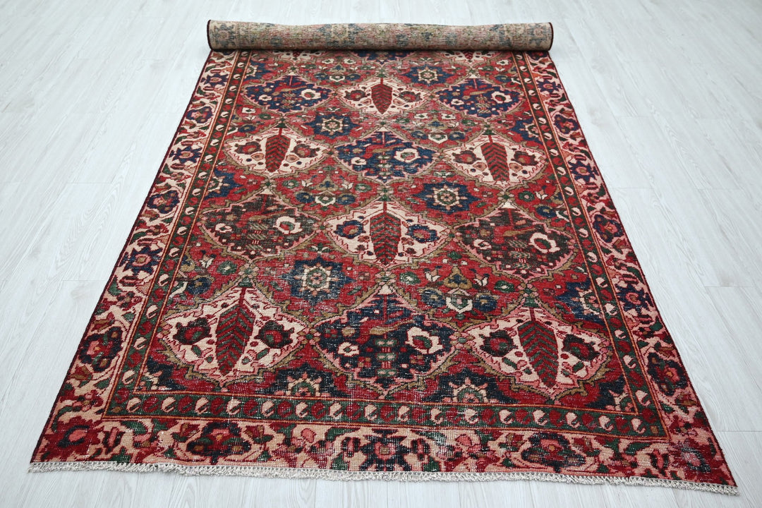 red Large rug 5' 0" x 9' 8"