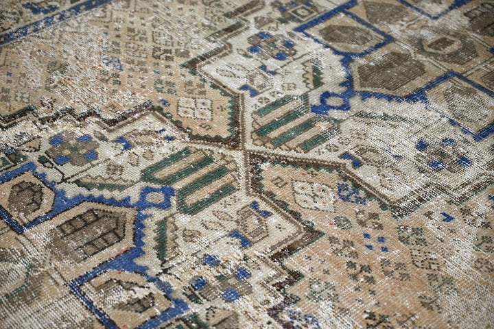 brown Large rug 4' 9" x 9' 9"