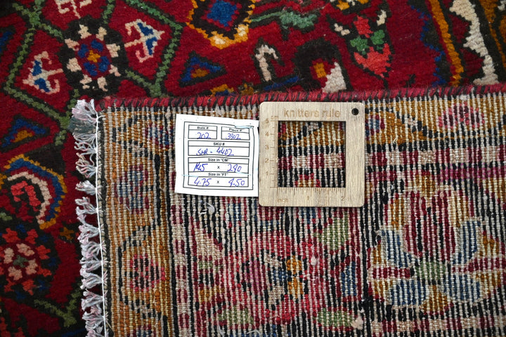 red Large rug 4' 9" x 9' 6"
