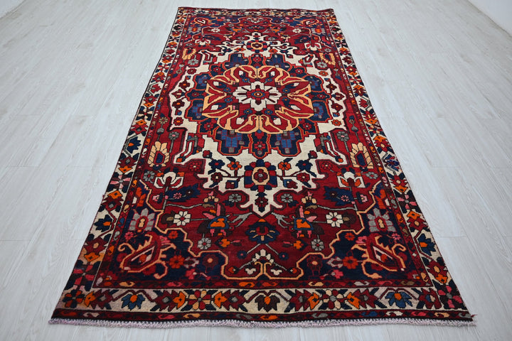 red Large rug 4' 8" x 10' 0"
