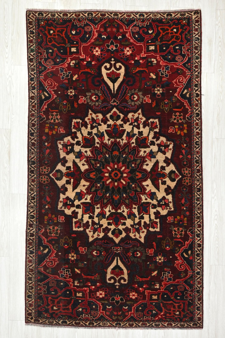 red Medium rug 3' 10" x 7' 5"