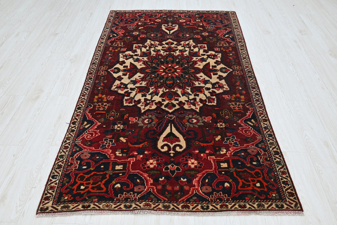 red Medium rug 3' 10" x 7' 5"
