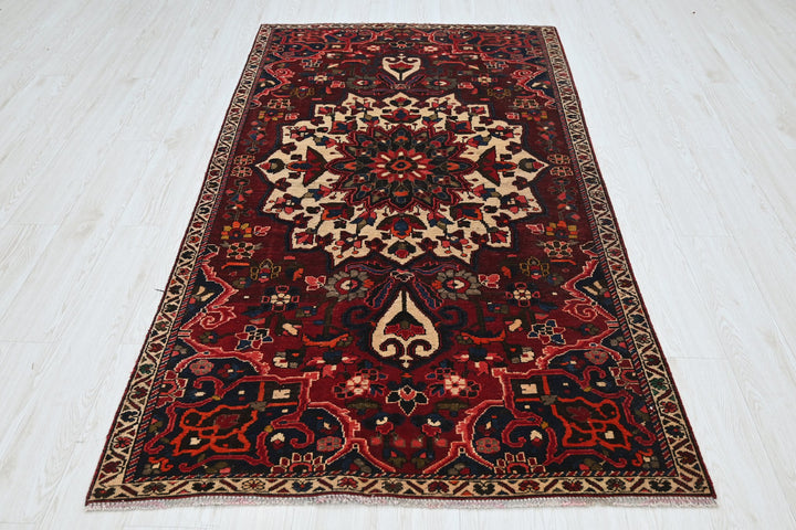 red Medium rug 3' 10" x 7' 5"