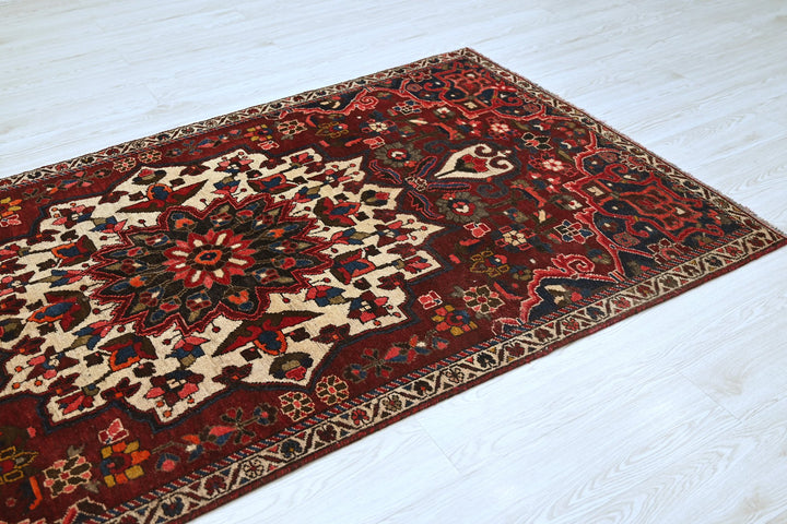 red Medium rug 3' 10" x 7' 5"
