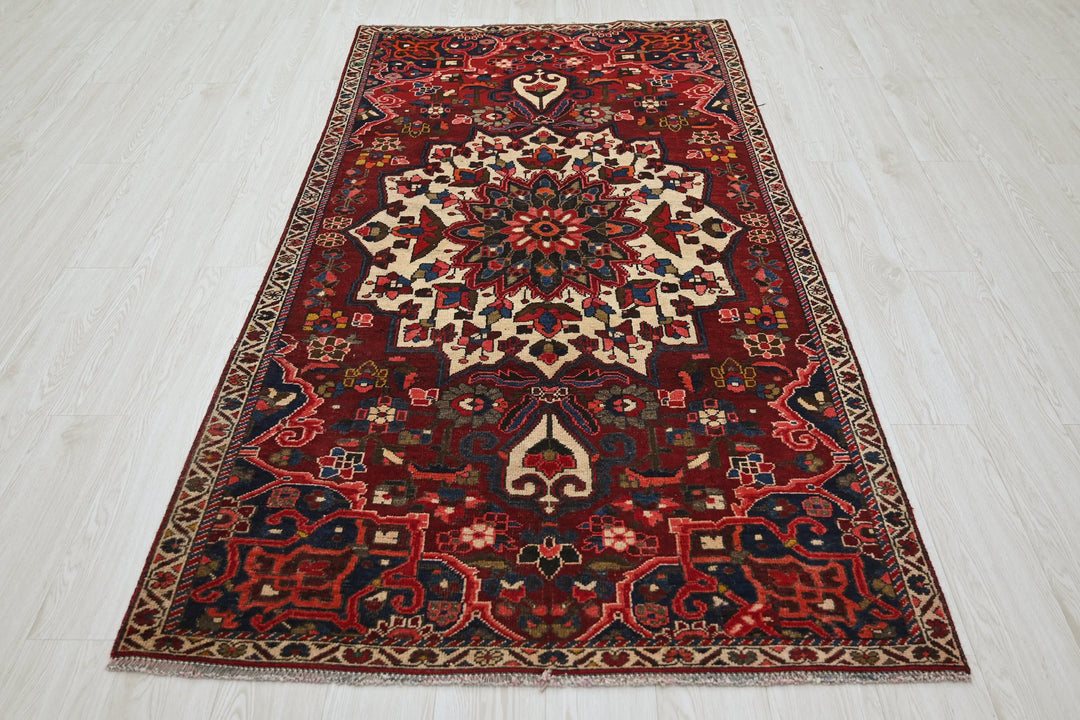 red Medium rug 3' 10" x 7' 5"