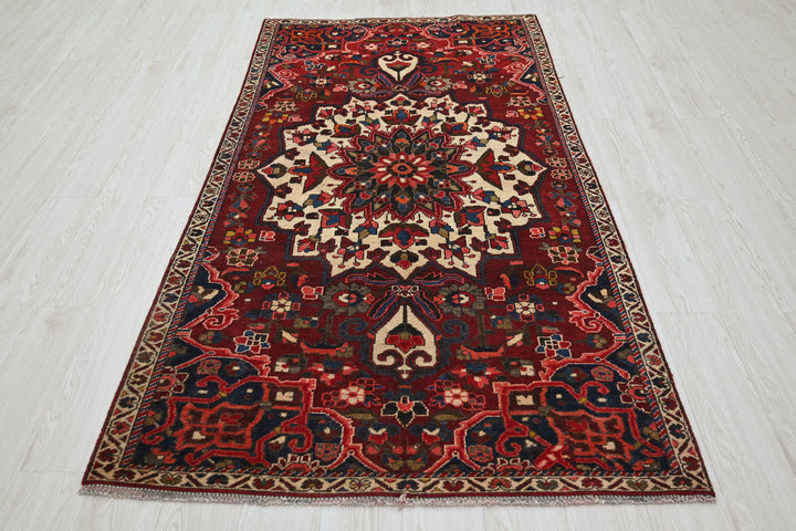 red Medium rug 3' 10" x 7' 5"