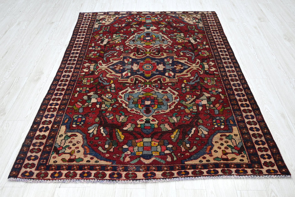 red Medium rug 4' 8" x 6' 7"