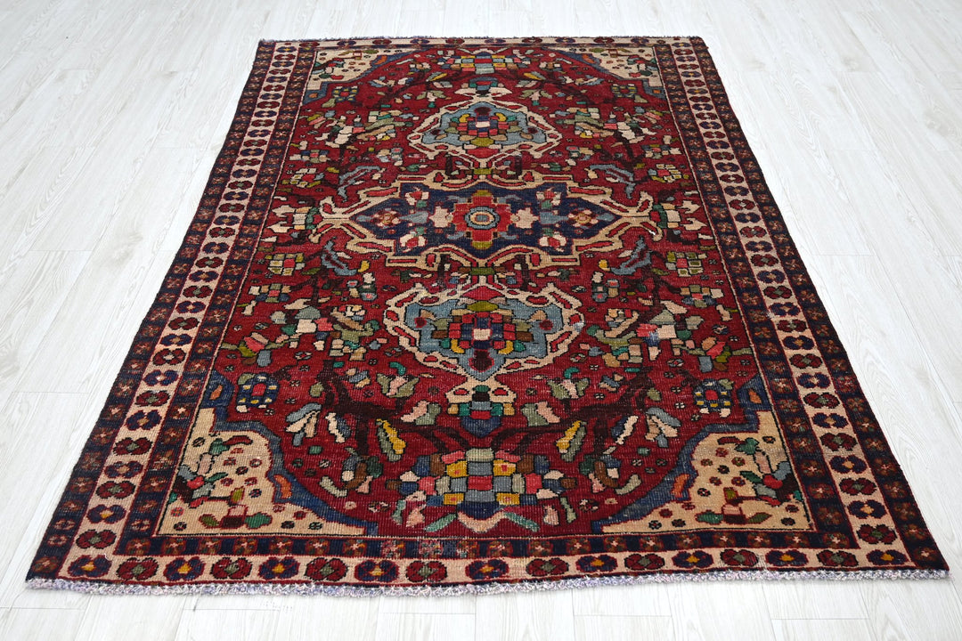 red Medium rug 4' 8" x 6' 7"