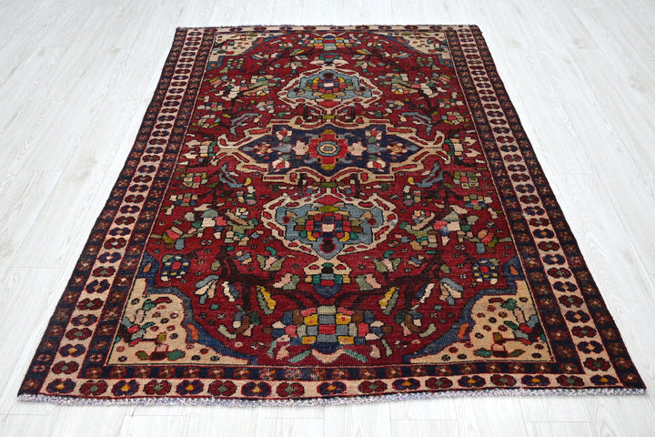 red Medium rug 4' 8" x 6' 7"