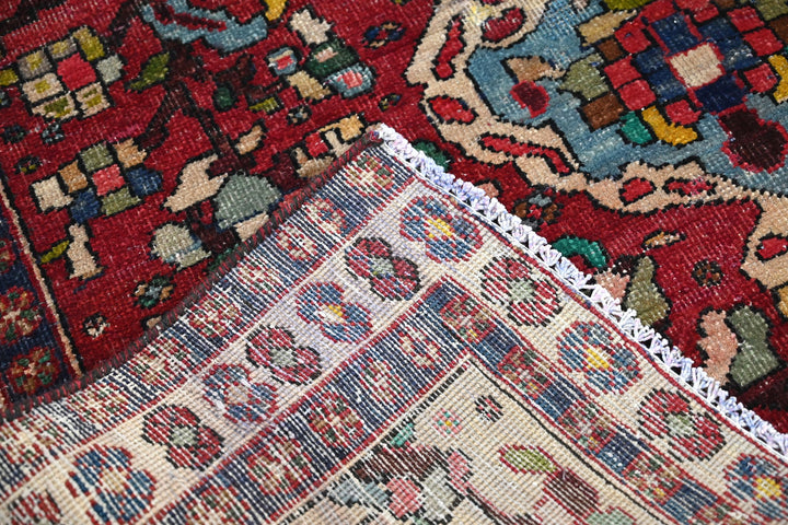 red Medium rug 4' 8" x 6' 7"