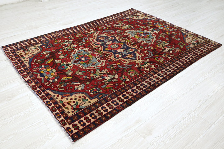 red Medium rug 4' 8" x 6' 7"