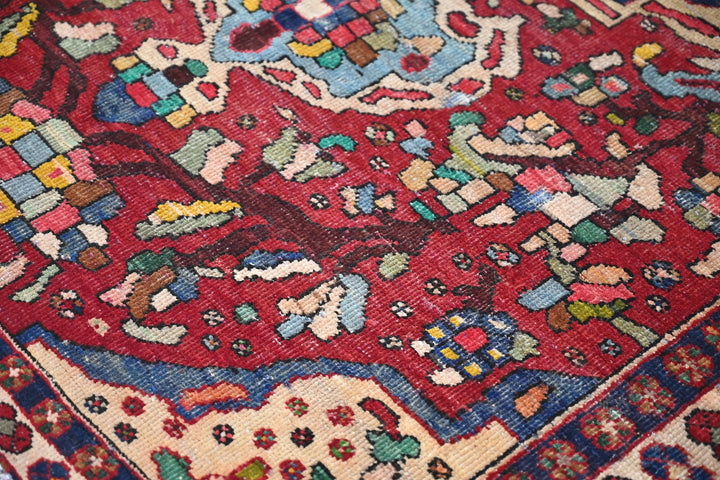 red Medium rug 4' 8" x 6' 7"
