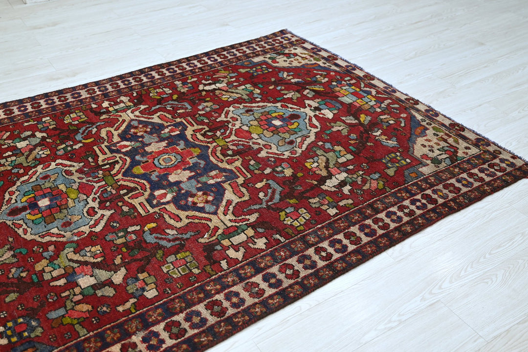 red Medium rug 4' 8" x 6' 7"