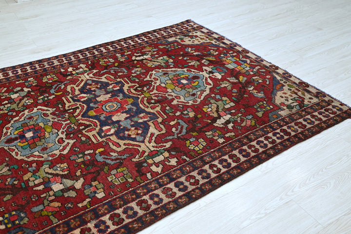 red Medium rug 4' 8" x 6' 7"