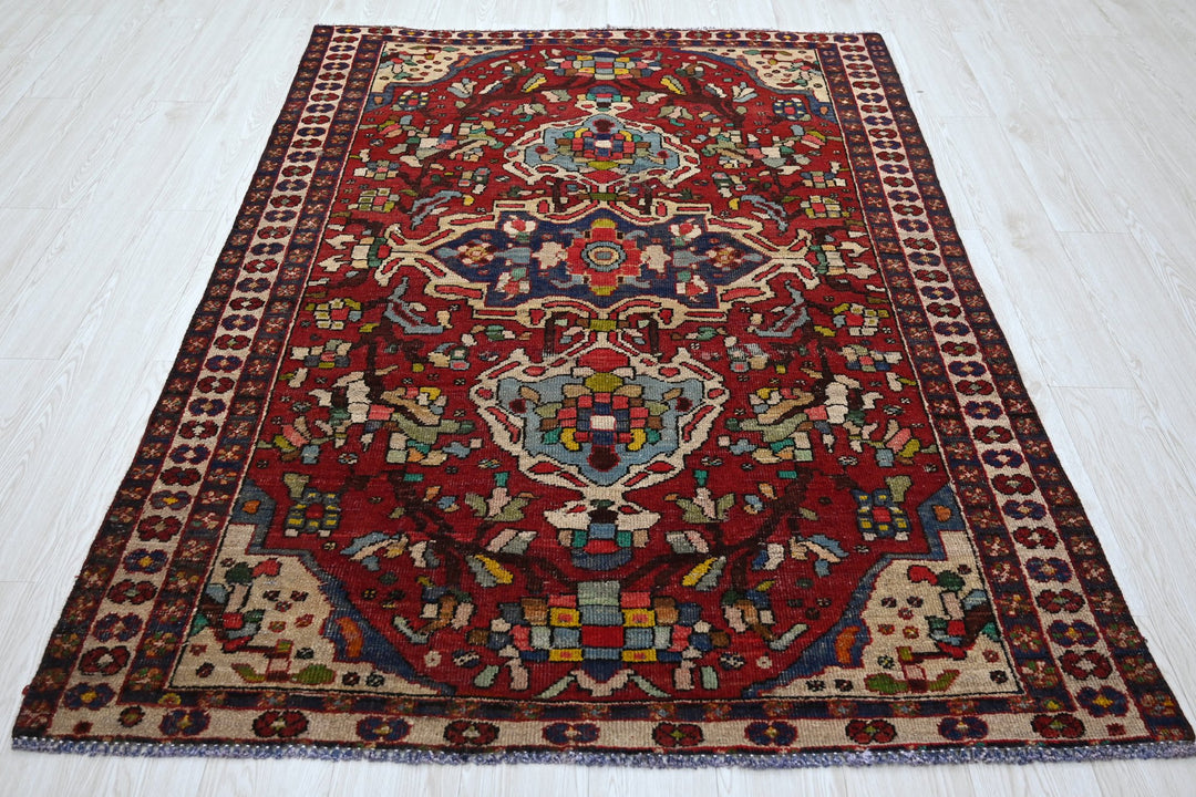 red Medium rug 4' 8" x 6' 7"