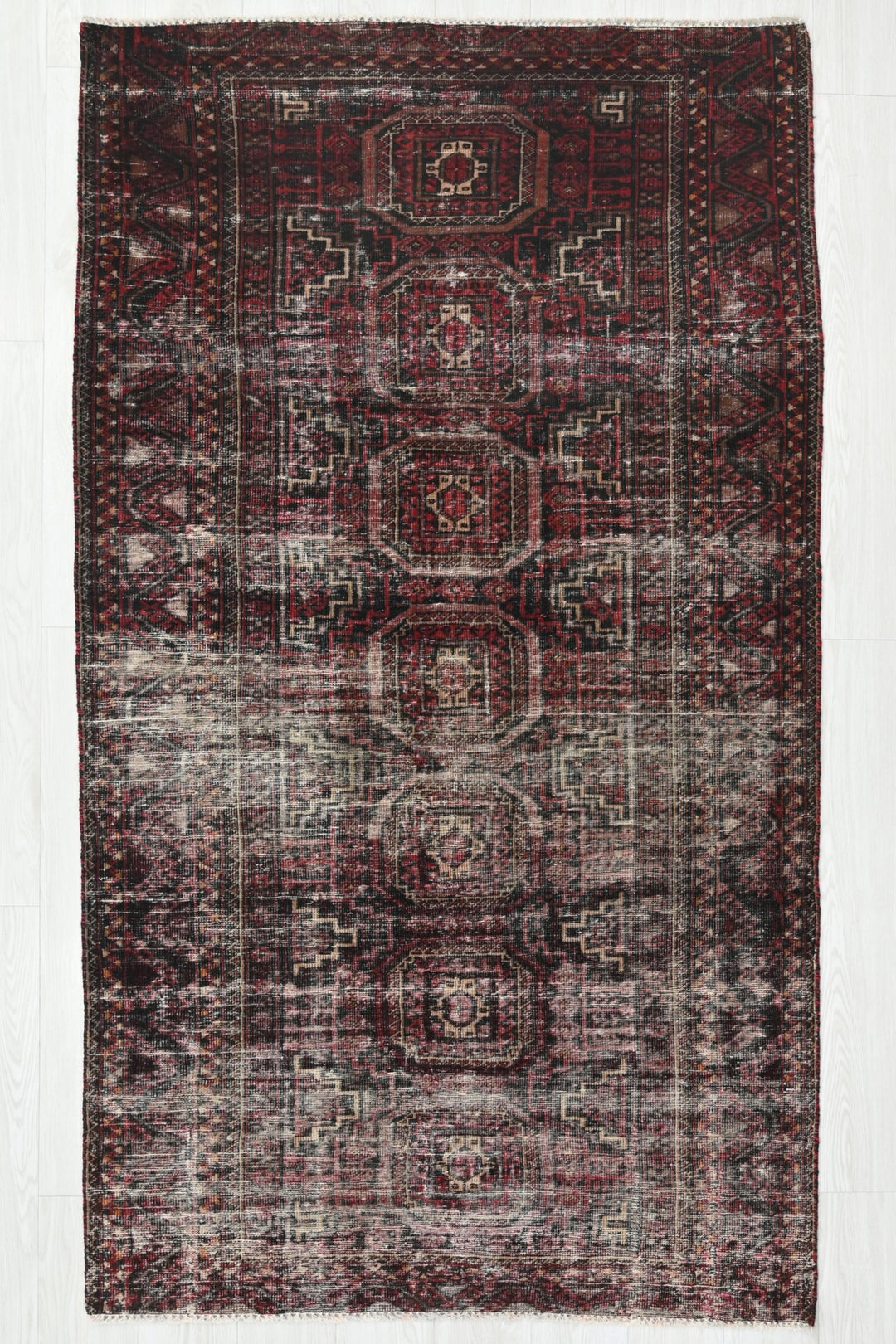 red Medium rug 3' 9" x 7' 0"