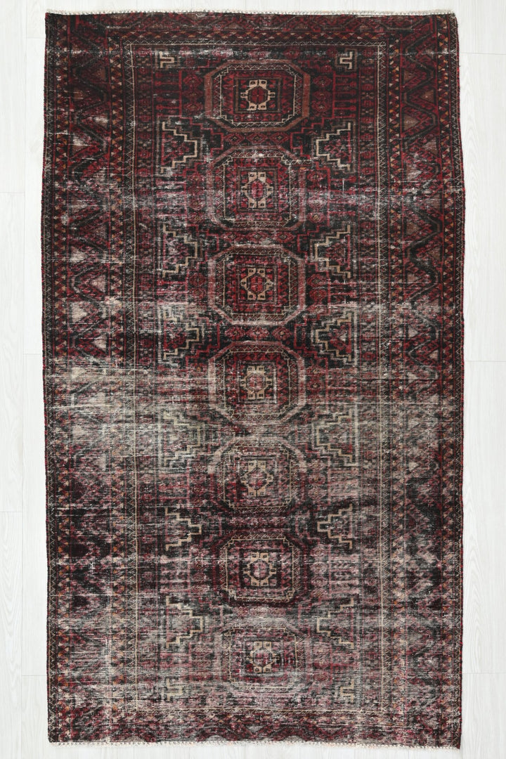 red Medium rug 3' 9" x 7' 0"