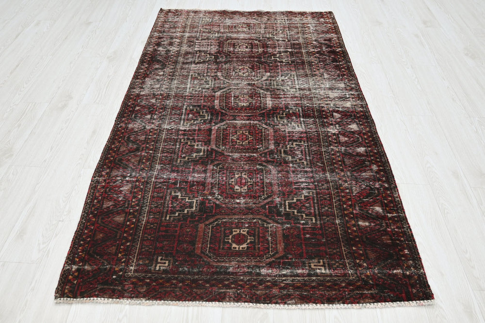 red Medium rug 3' 9" x 7' 0"