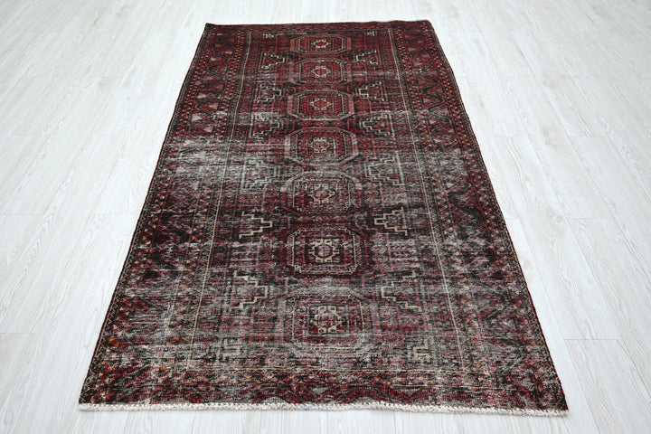 red Medium rug 3' 9" x 7' 0"