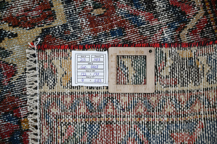 brown Accent rug 4' 0" x 5' 10"