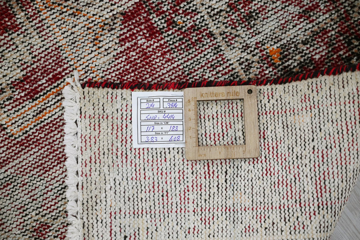 red Accent rug 3' 10" x 6' 2"