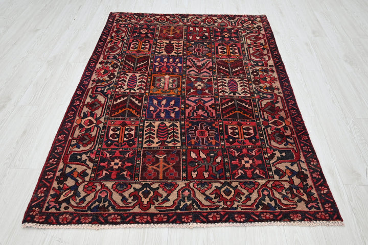 red Accent rug 4' 3" x 6' 4"