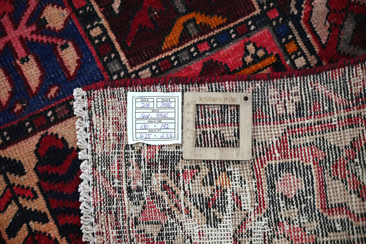 red Accent rug 4' 3" x 6' 4"