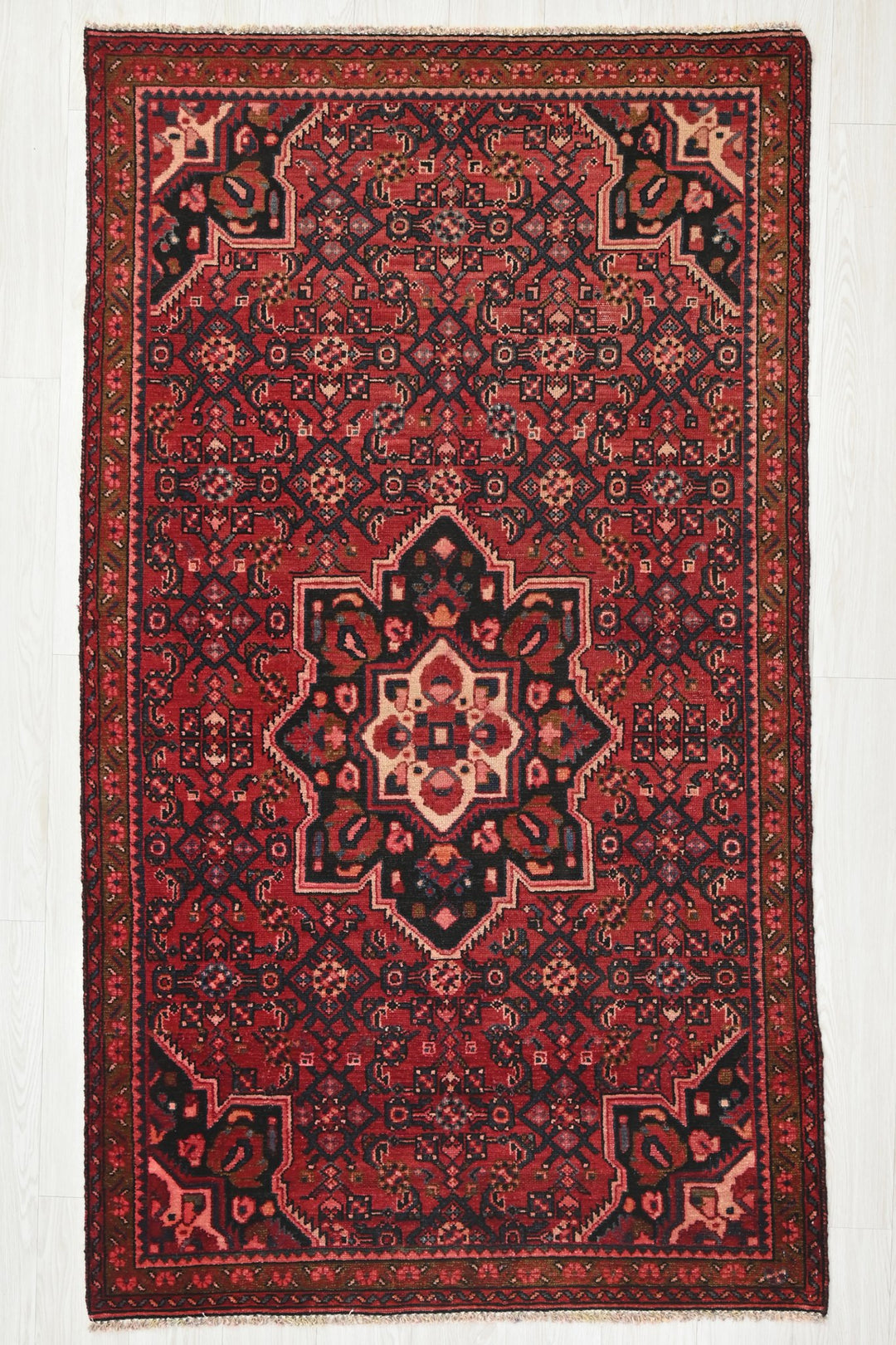 red Medium rug 3' 10" x 7' 0"