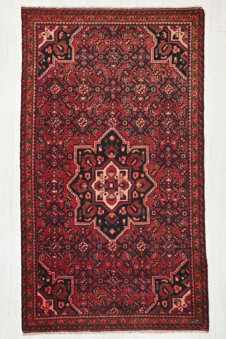 red Medium rug 3' 10" x 7' 0"