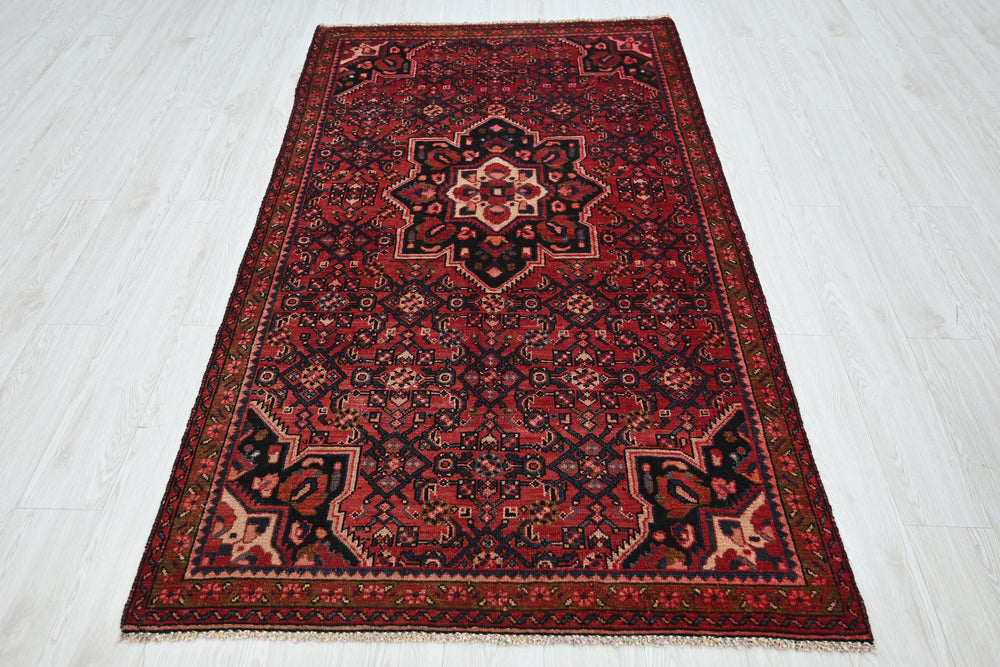 red Medium rug 3' 10" x 7' 0"