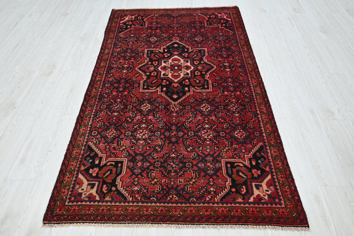 red Medium rug 3' 10" x 7' 0"