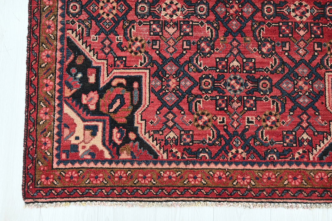 red Medium rug 3' 10" x 7' 0"
