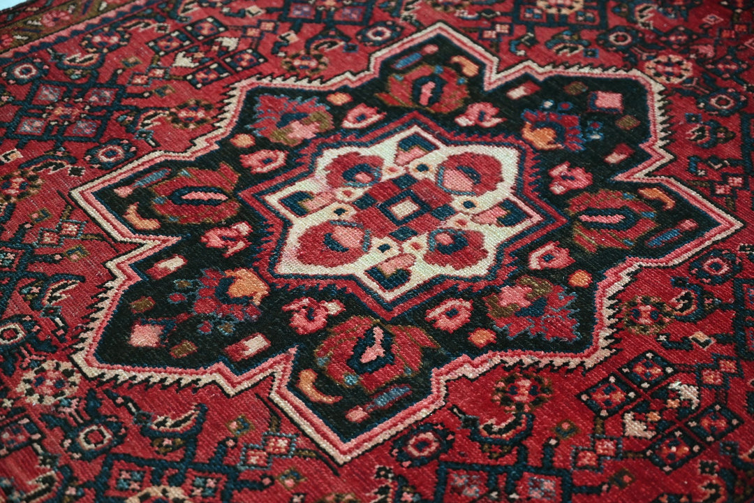 red Medium rug 3' 10" x 7' 0"