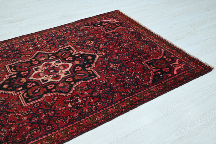 red Medium rug 3' 10" x 7' 0"
