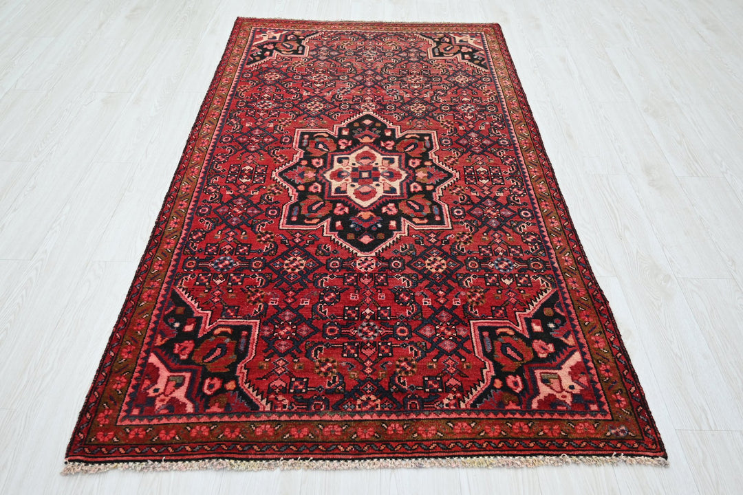 red Medium rug 3' 10" x 7' 0"