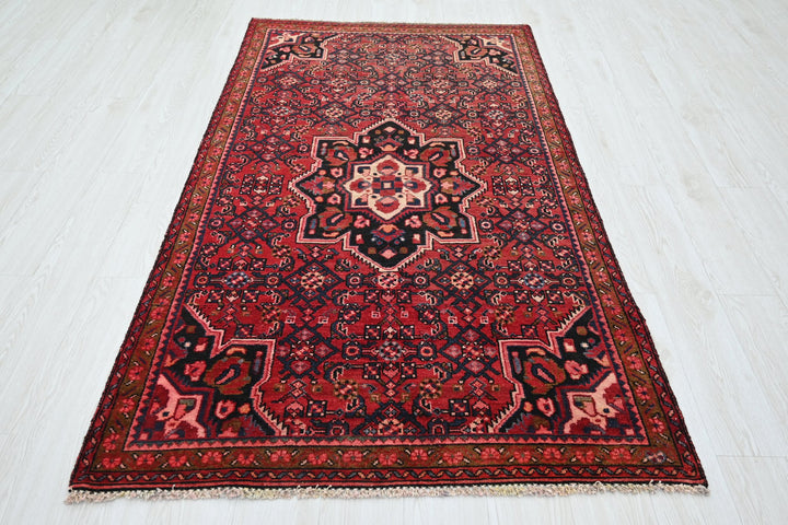 red Medium rug 3' 10" x 7' 0"