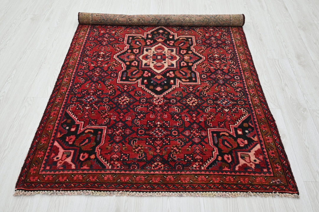 red Medium rug 3' 10" x 7' 0"