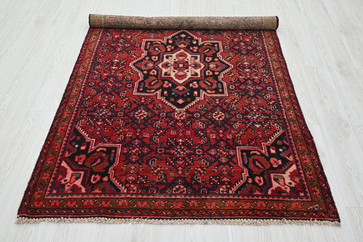 red Medium rug 3' 10" x 7' 0"