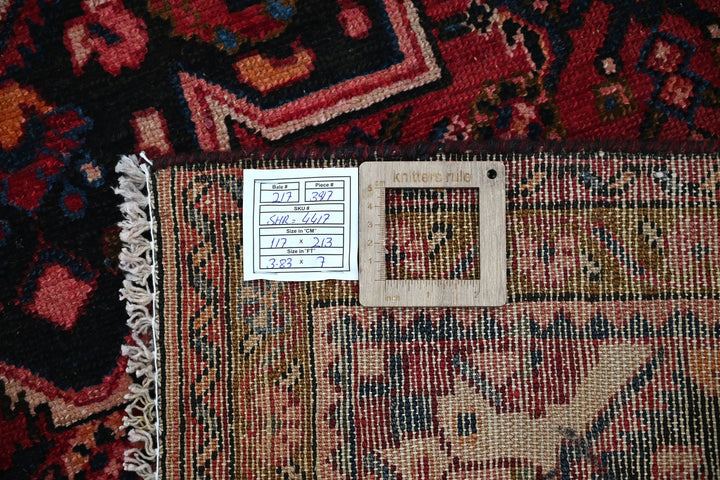 red Medium rug 3' 10" x 7' 0"