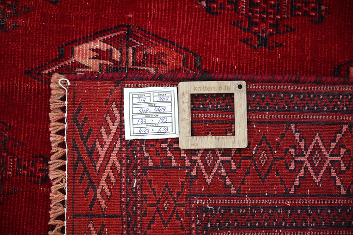 red Accent rug 4' 4" x 6' 4"