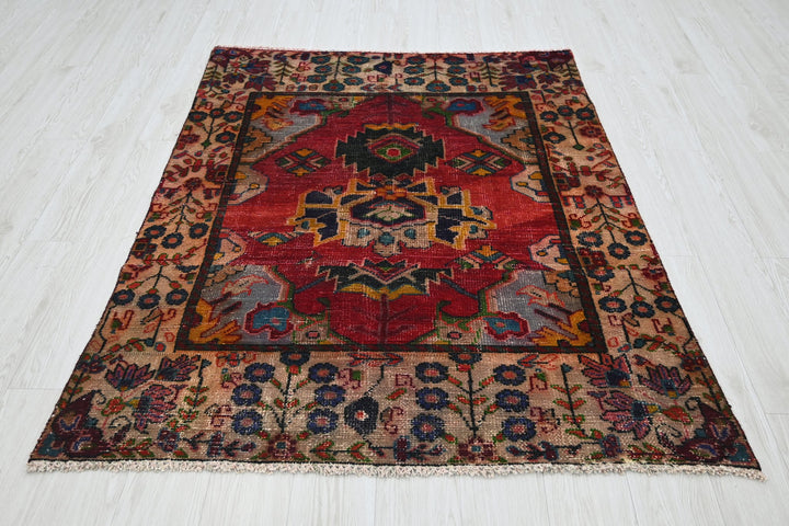 red Accent rug 4' 2" x 5' 4"