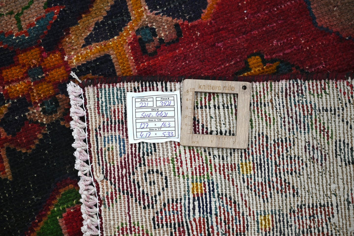 red Accent rug 4' 2" x 5' 4"